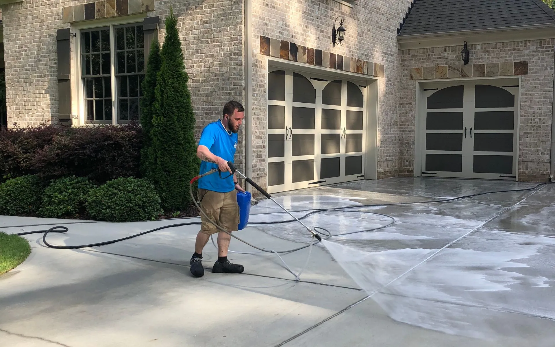 Professional driveway cleaning in progress